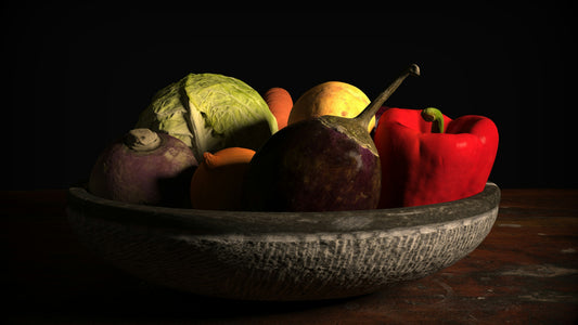 Rustic bowl of fresh vegetables, cabbage and peppers in dark light